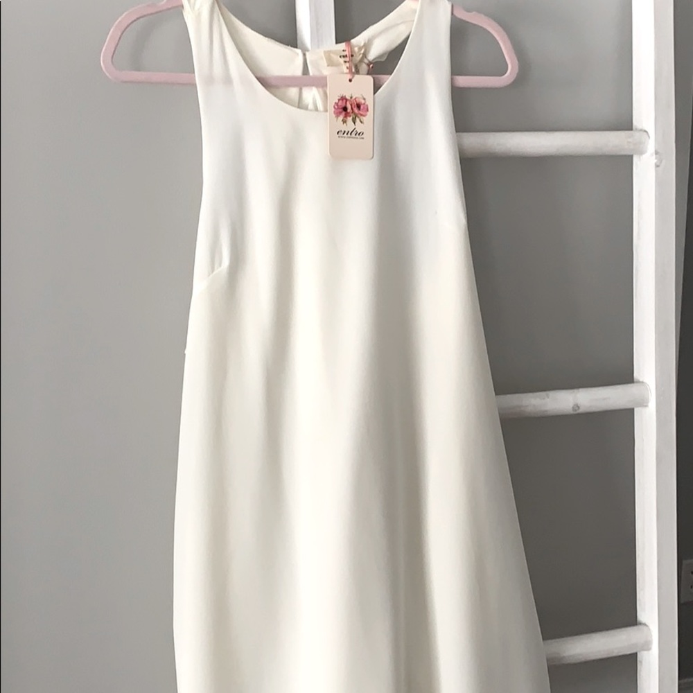 White ruffle back dress